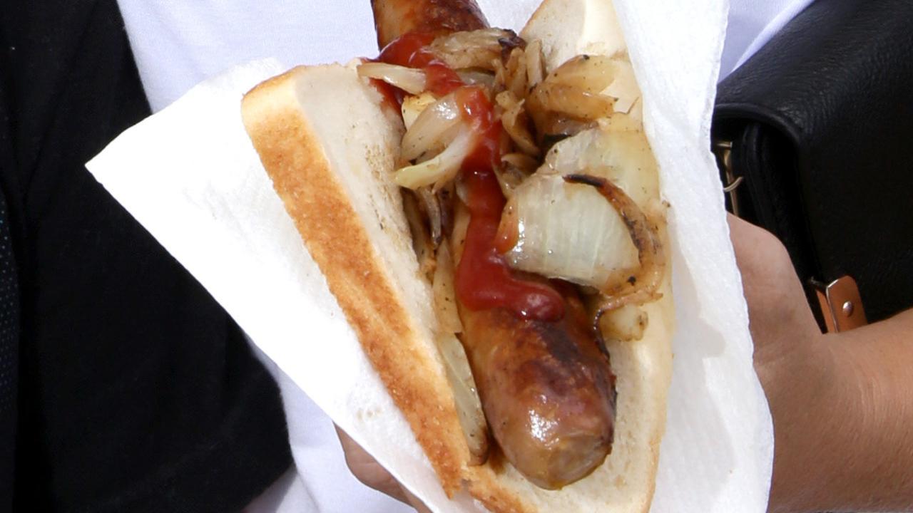 Bunnings sausage in bread change snag must be on top of onion now for