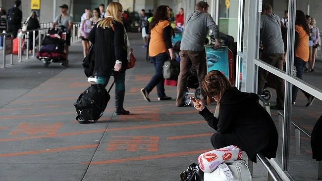 Flying into smoky haze at Melbourne Airport as smoking is banned at