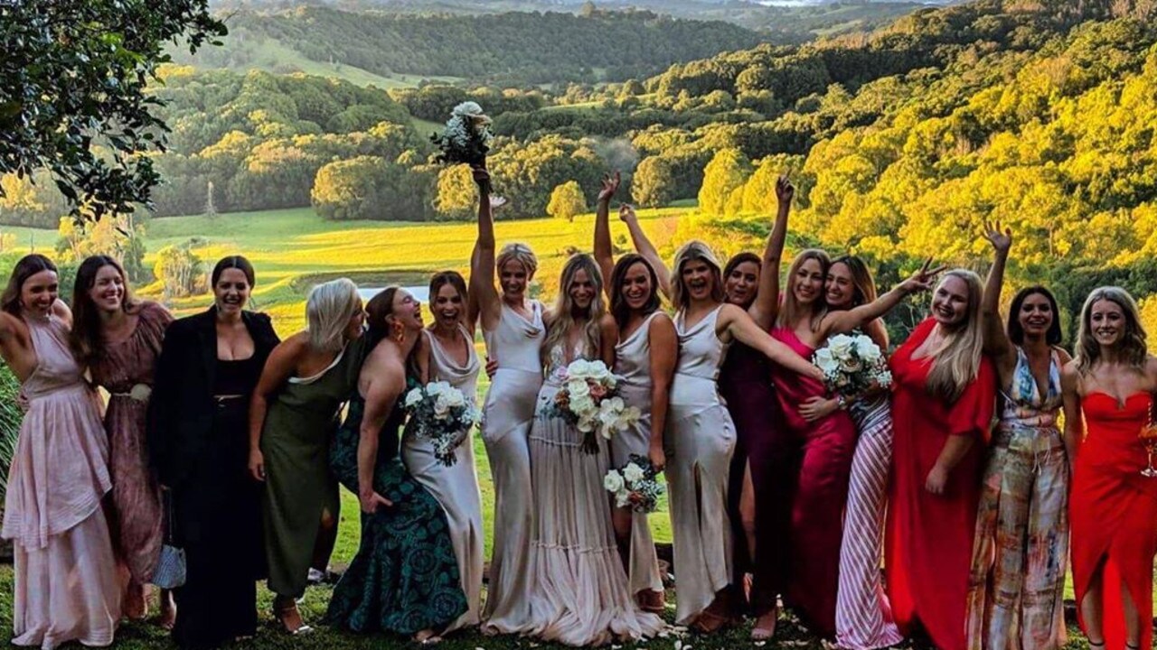 Margot Robbie serves as a bridesmaid at a friend’s wedding
