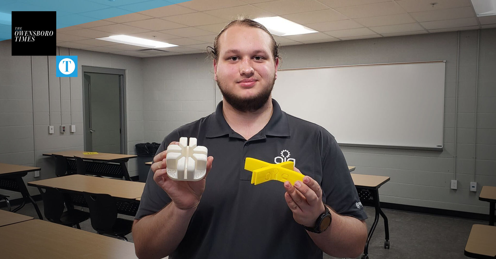 Student using 3D printer to create hundreds of plexiglass holders for