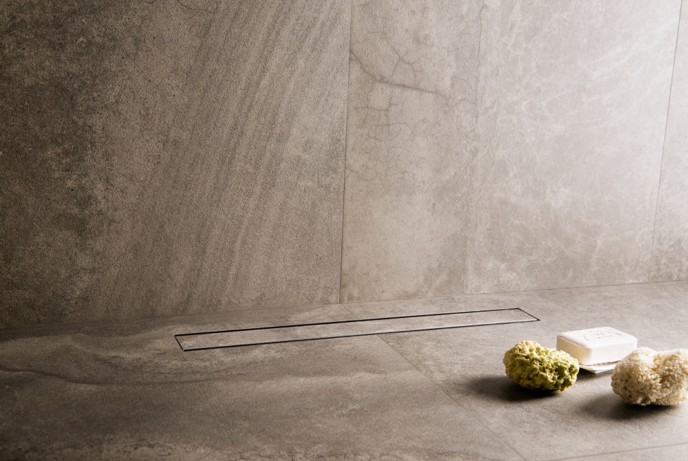 Hoe installeer je een douchegoot?