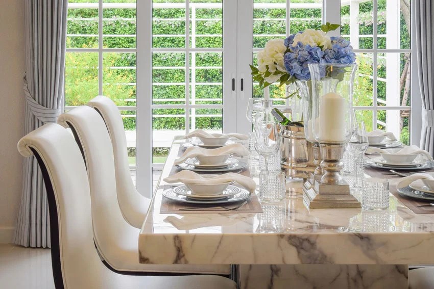 Dining tables can be square, rectangular, round, and oval and come in many sizes. Marble Dining Table Designs Pros And Cons Costs And Tips