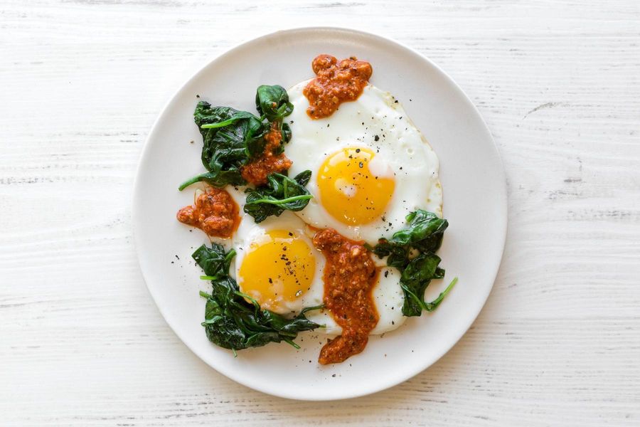 Fried eggs with spinach and romesco Sunbasket