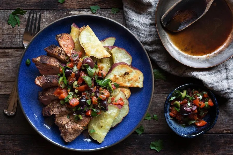 Pork blade steaks with roasted sweet potatoes and redpepper salsa