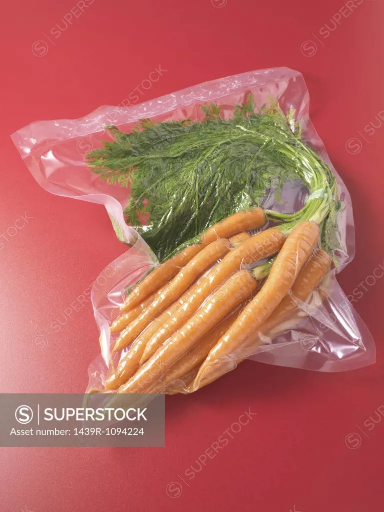 Vacuum packed carrots SuperStock