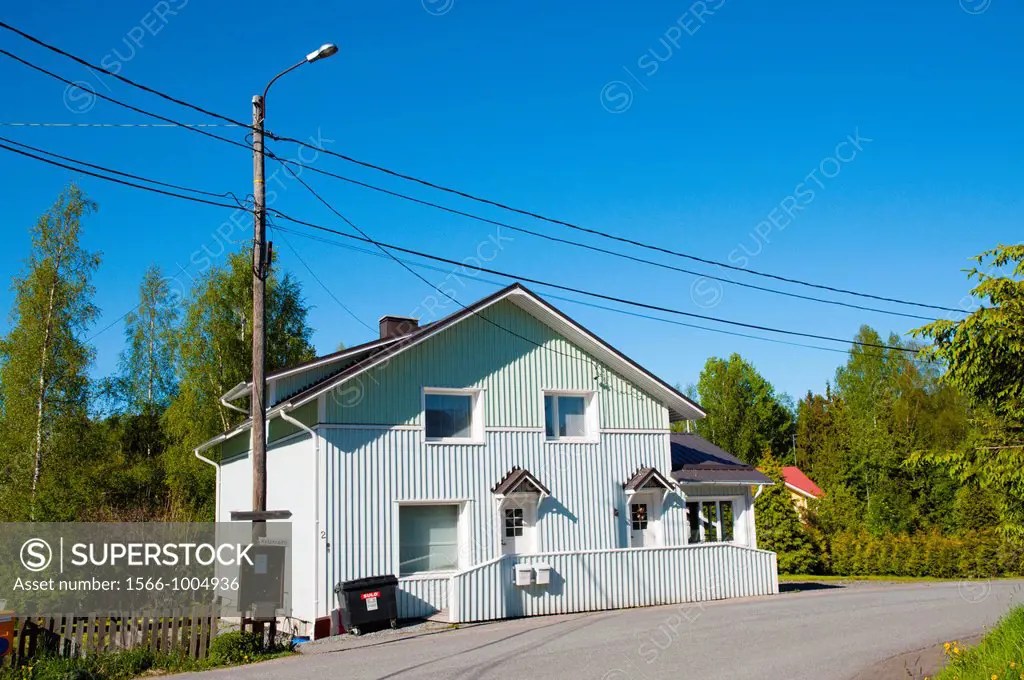 Refurbished traditional wooden house with new artificial surface