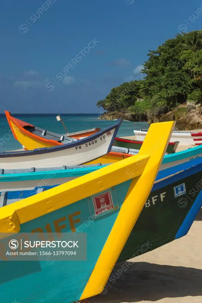 ROW OF BRIGHTLY PAINTED YOLA FISHING BOATS CRASH BOAT BEACH AGUADILLA