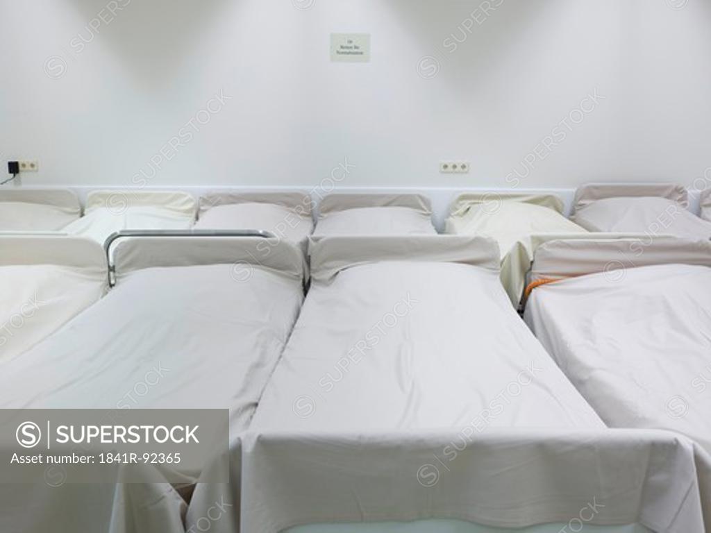 Empty beds in hospital SuperStock