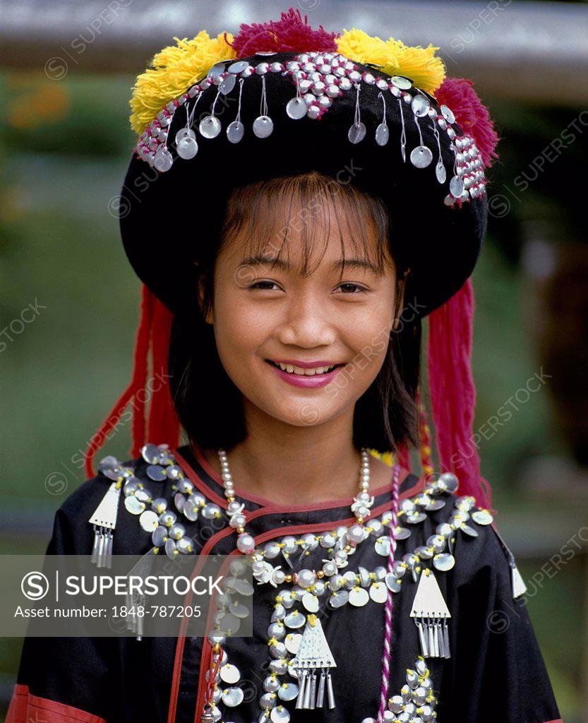 Lisu girl wearing a colourful headdress and the traditional costume of