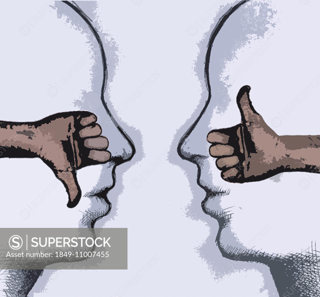 Thumbs up and thumbs down inside of opposite heads SuperStock