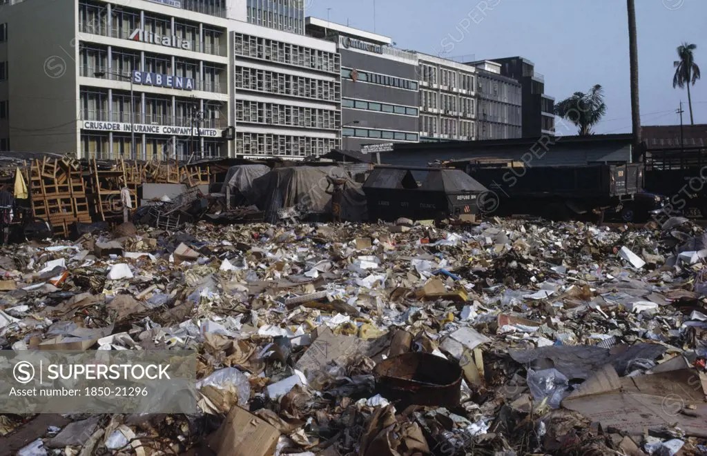 Nigeria, Lagos, Rubbish Dump In Centre Of Modern City. SuperStock