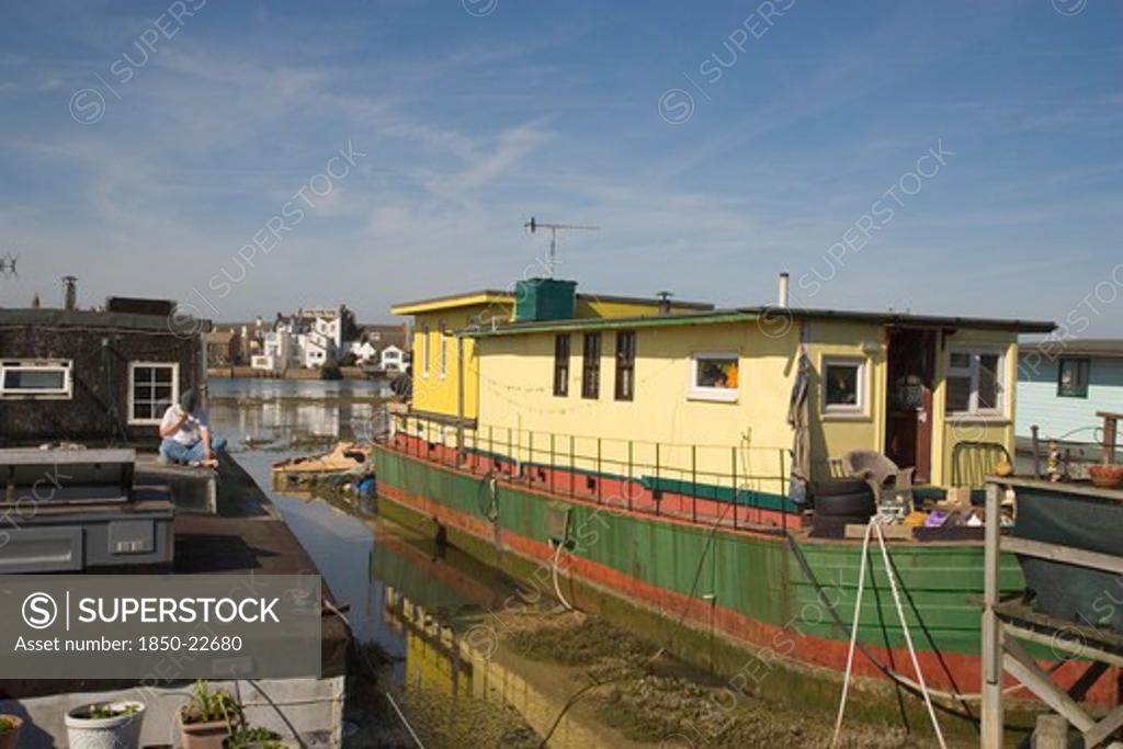 England, West Sussex, ShorehamBySea, Houseboat Moored Along The Banks