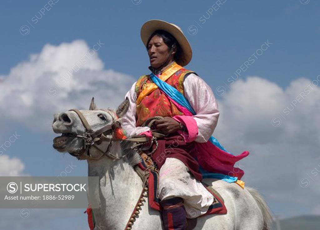 Khampas, the warrior horseman of old Tibet, compete at the Litang Horse