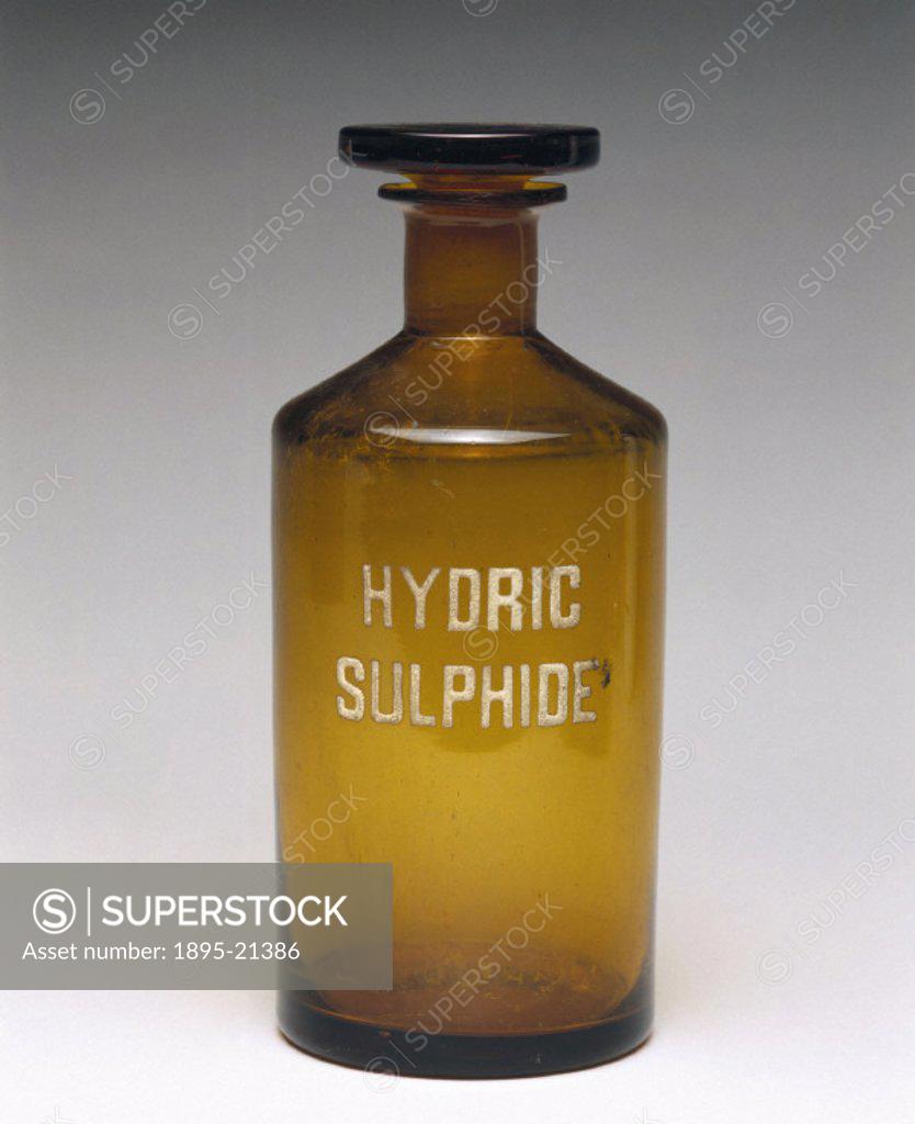Reagent bottle with an embossed, fired label and a ground glass stopper. A reagent is a