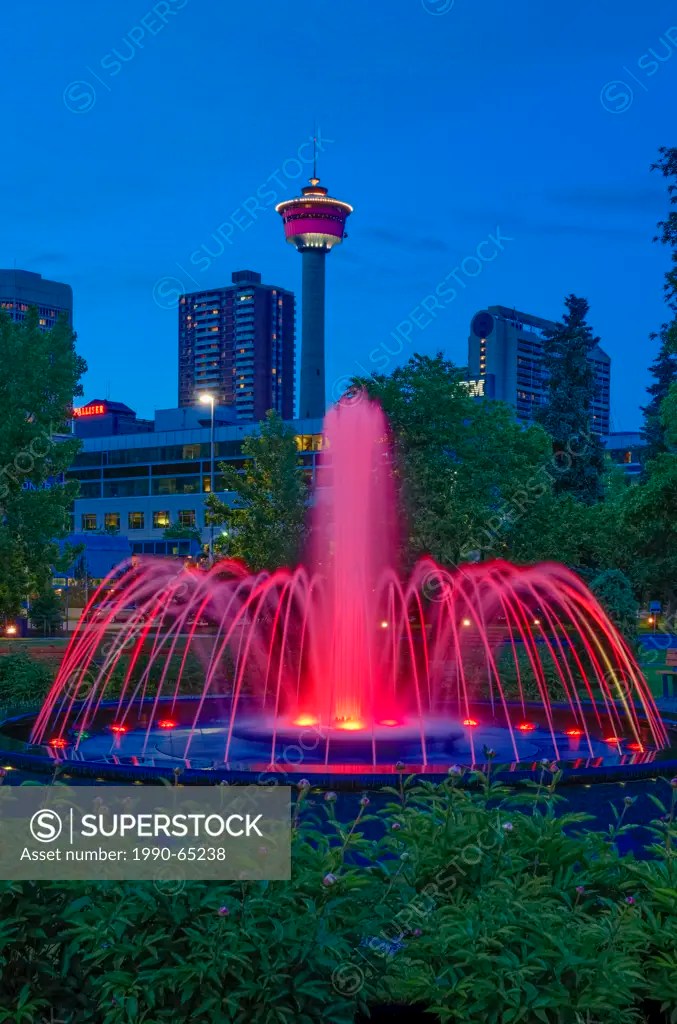 Illuminated fountain with the Calgary Tower in the distance, Central