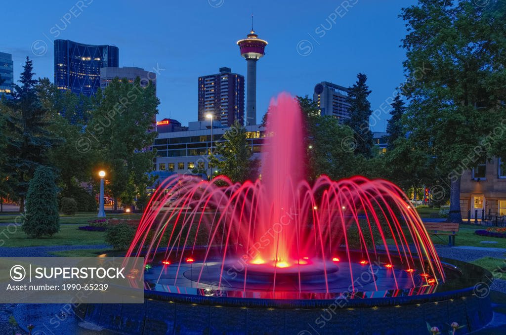 Illuminated fountain with the Calgary Tower in the distance, Central