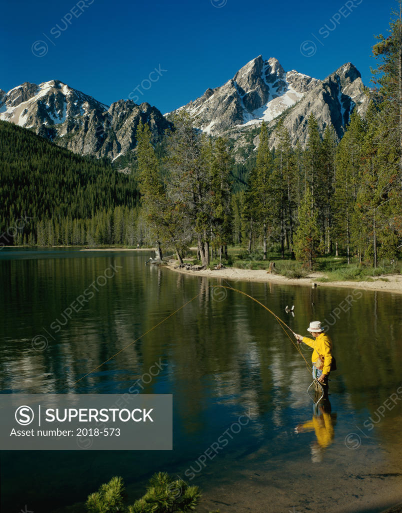 Person fly fishing at Stanley Lake, Sawtooth National Recreation Area