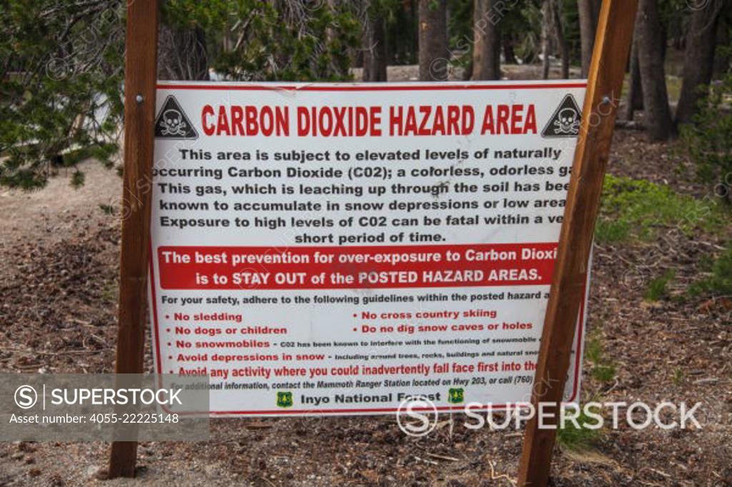Carbon Dioxide Hazard Area warning sign. Dead trees around Horseshoe