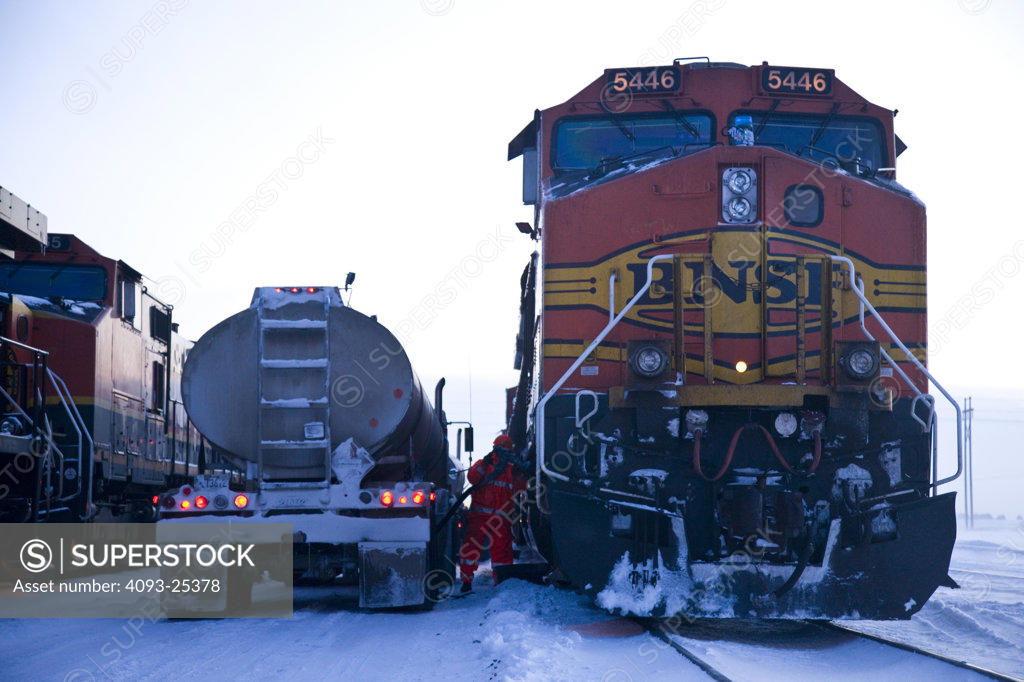 Fuel truck refueling a 2005 BNSF diesel SuperStock