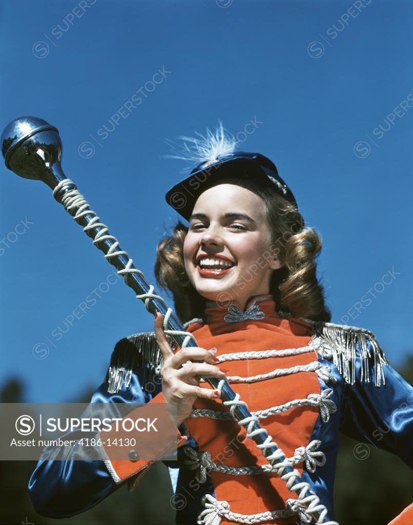 1940S 1950S Smiling Teen Girl Majorette Drum Major In Uniform Holding A