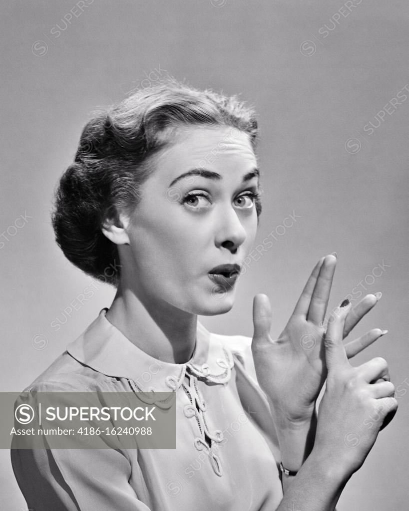 1940s 1950s EXPRESSIVE WOMAN PURSED LIPS RAISED EYEBROWS LOOKING AT