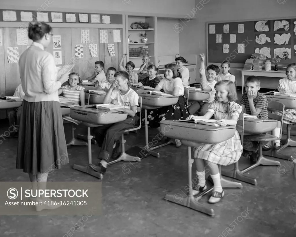 1950s 19560s CLASSROOM ELEMENTARY GRADE SCHOOL TEACHER BACK TO CAMERA