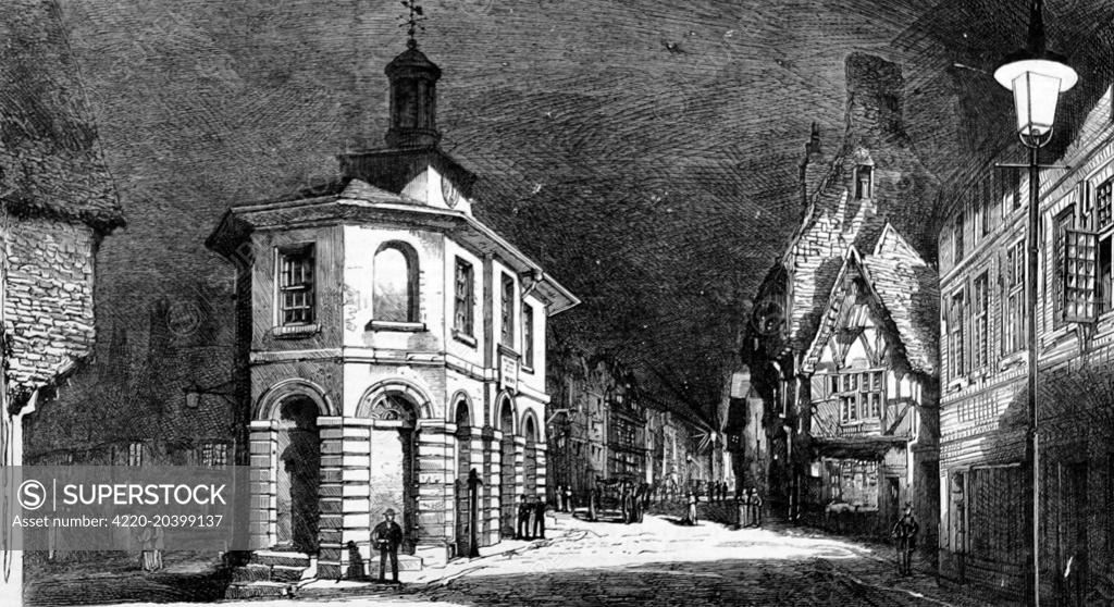 Engraving from 1881showing the town of Godalming in Surrey illuminated