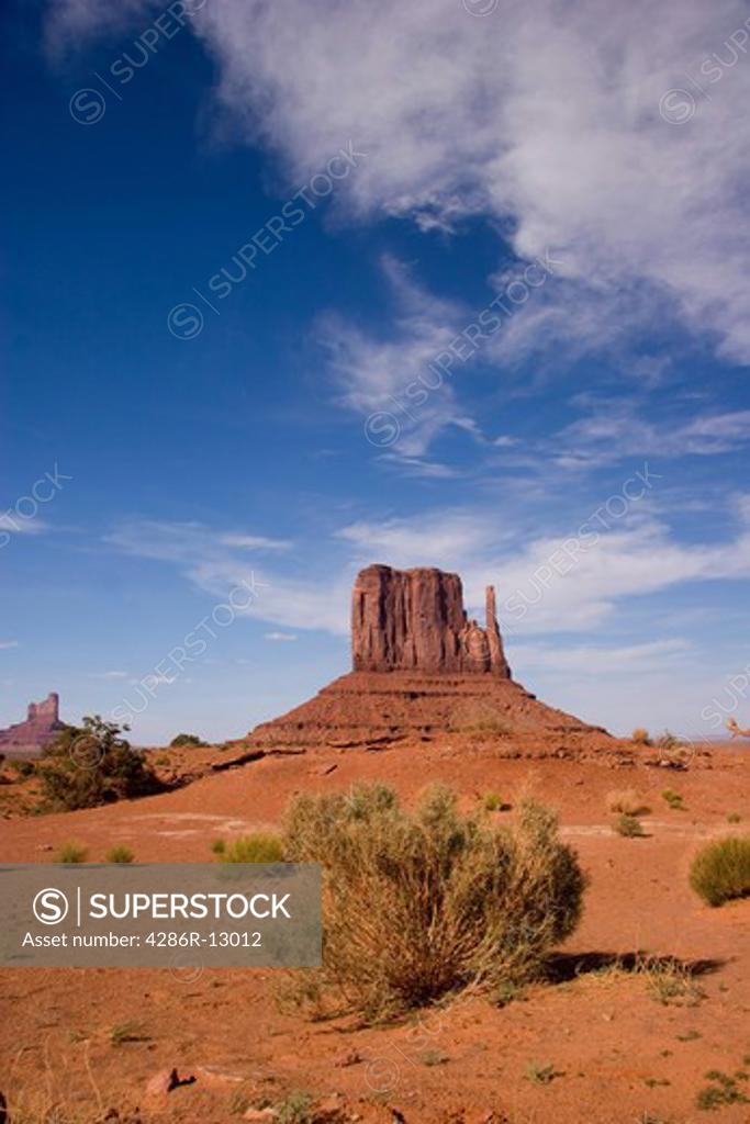 Desert sand and Rock formations at Monument Valley in the Navajo Tribal