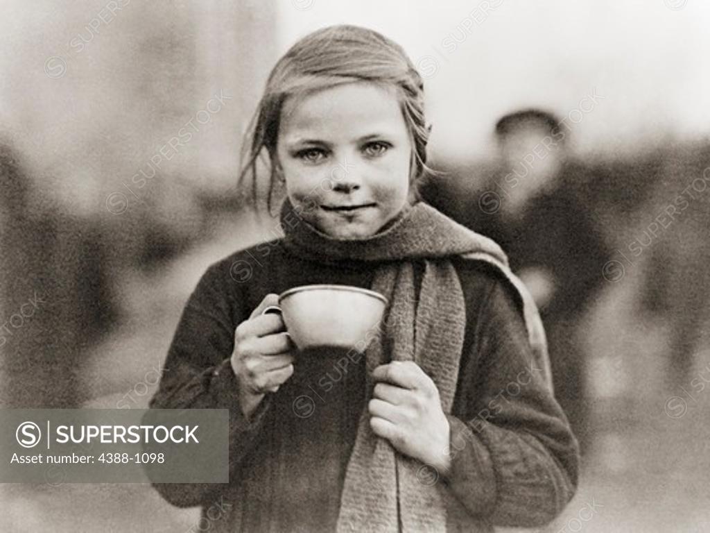 Young Girl with Tin Cup SuperStock