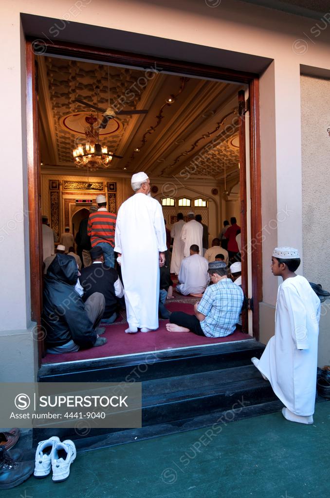 Men gathering for prayers on Friday. Juma Masjid Mosque, the largest