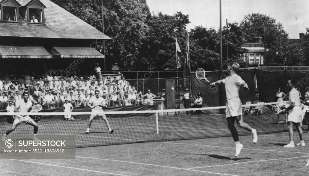 Lew Hoad and Rex Hartwig, Aussie doubles team, right, are seen in