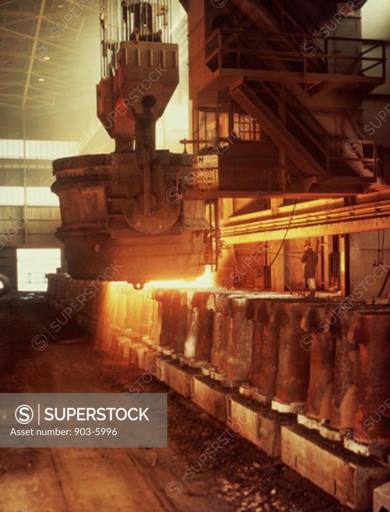 Foundry worker working on a blast furnace in a steel mill, US Steel