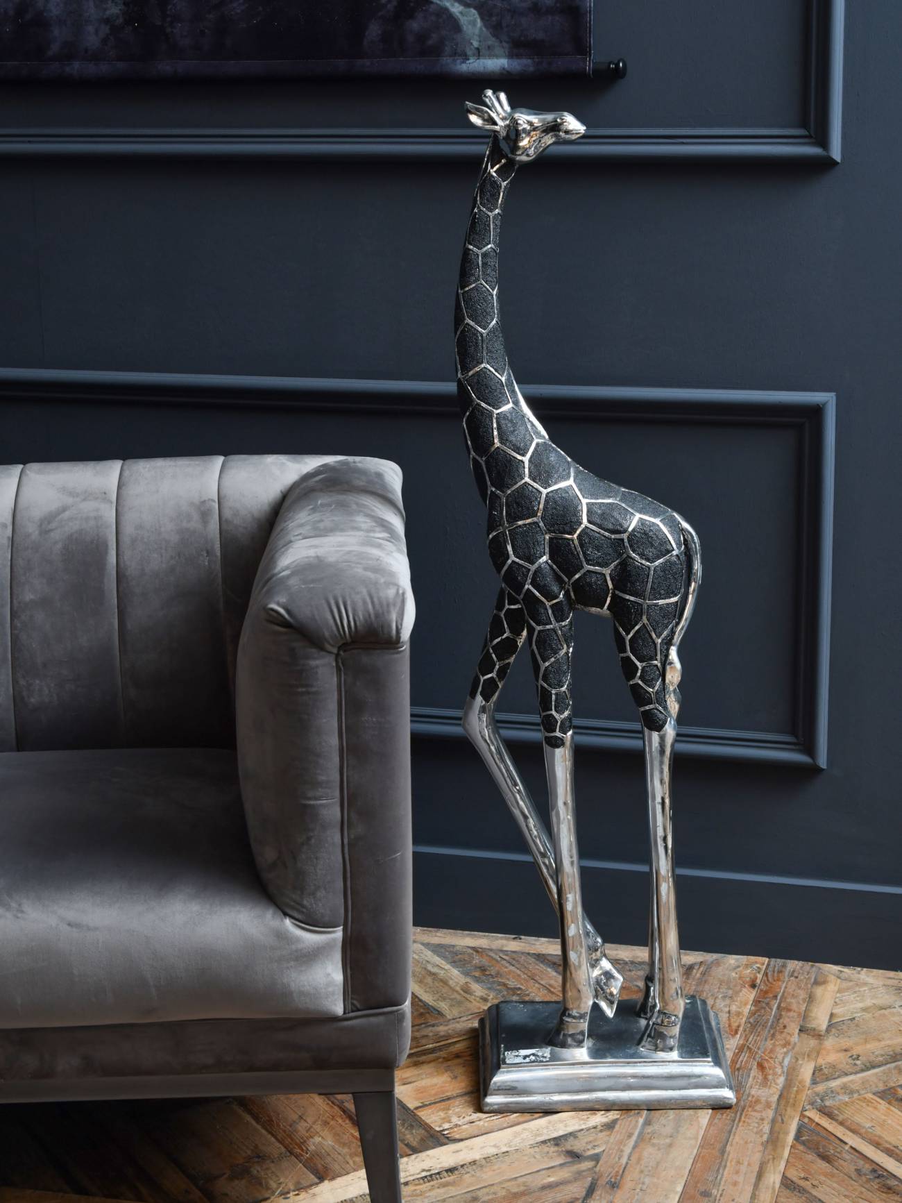 Giant Giraffe Sculpture, with its head looking back