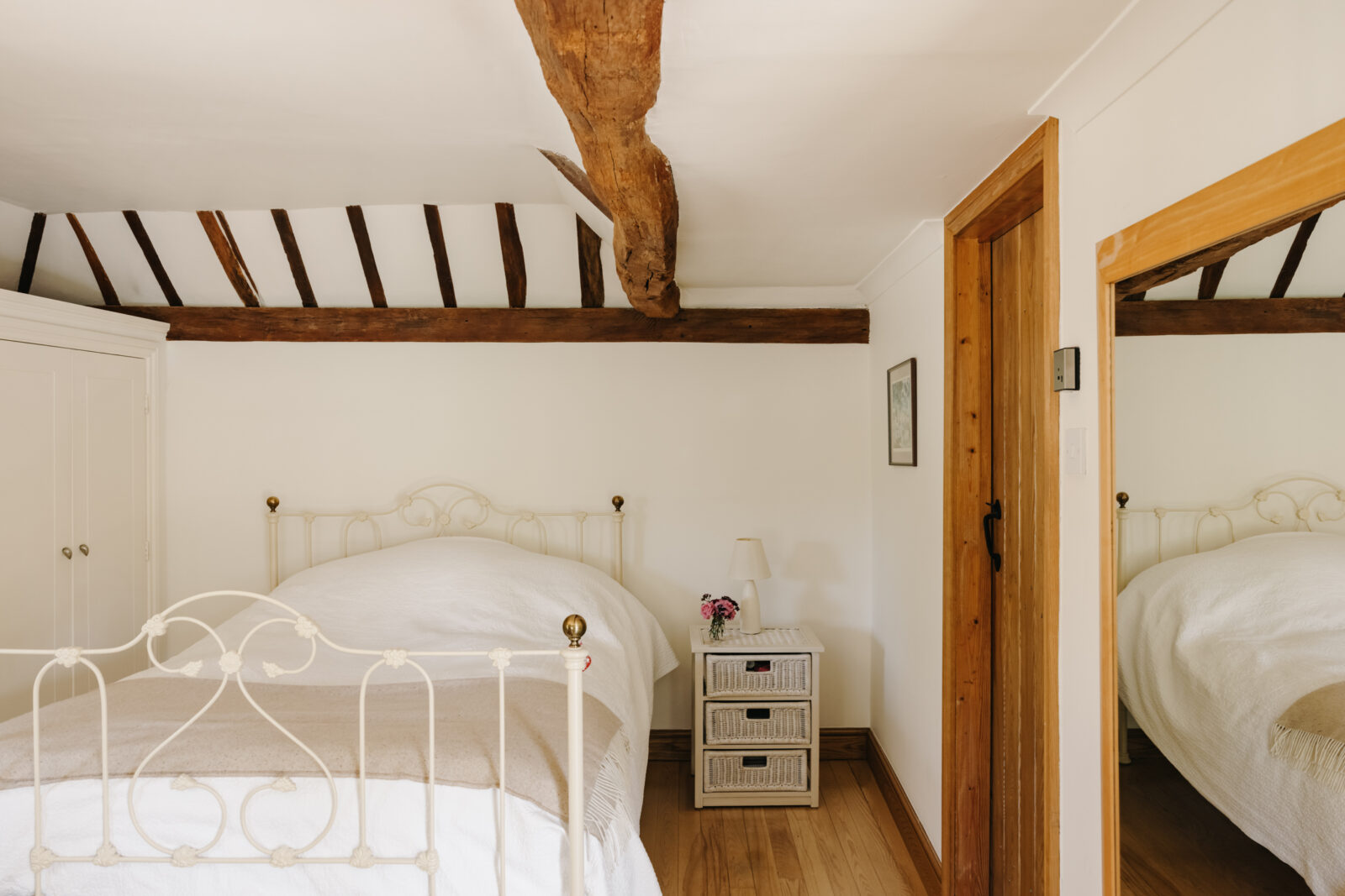 This converted coach house sleeps 10 under original wood beams The Spaces