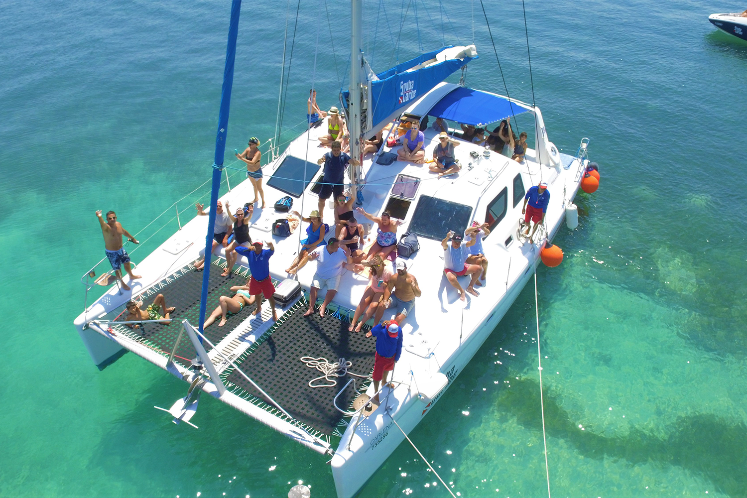 Web 9 hours (approx.) pickup offered mobile ticket offered in: Catamaran Day Cruise to Isla Mujeres ScubaCaribe