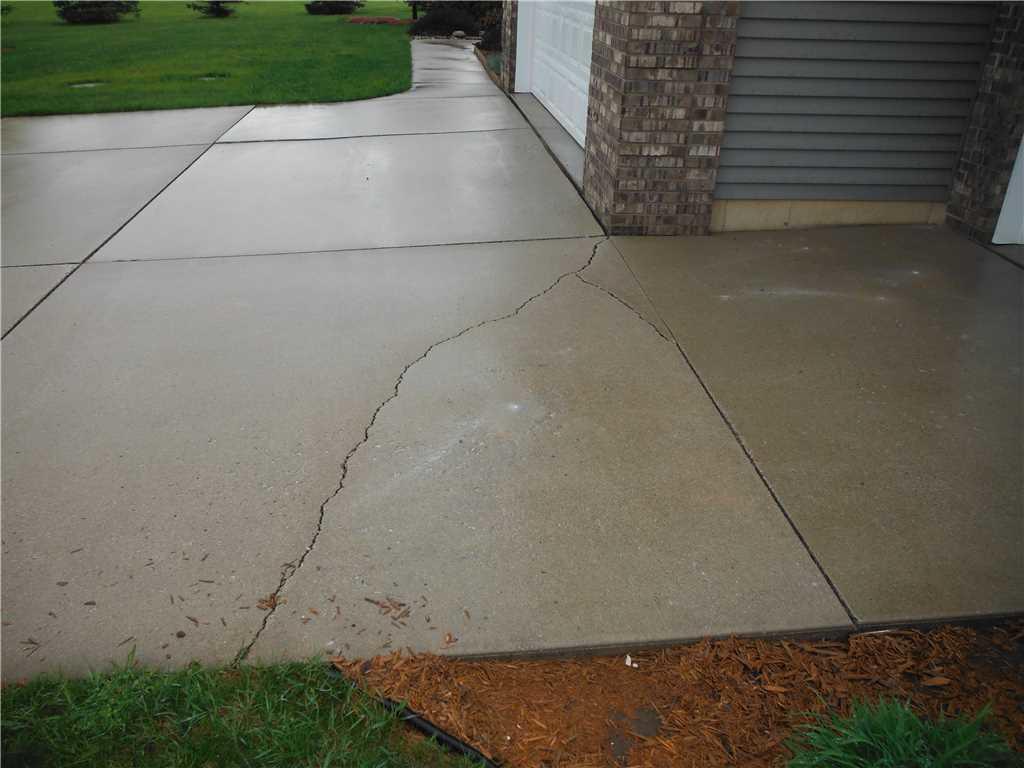 Ayers Basement Systems Before & After Photo Set Sinking Cement in