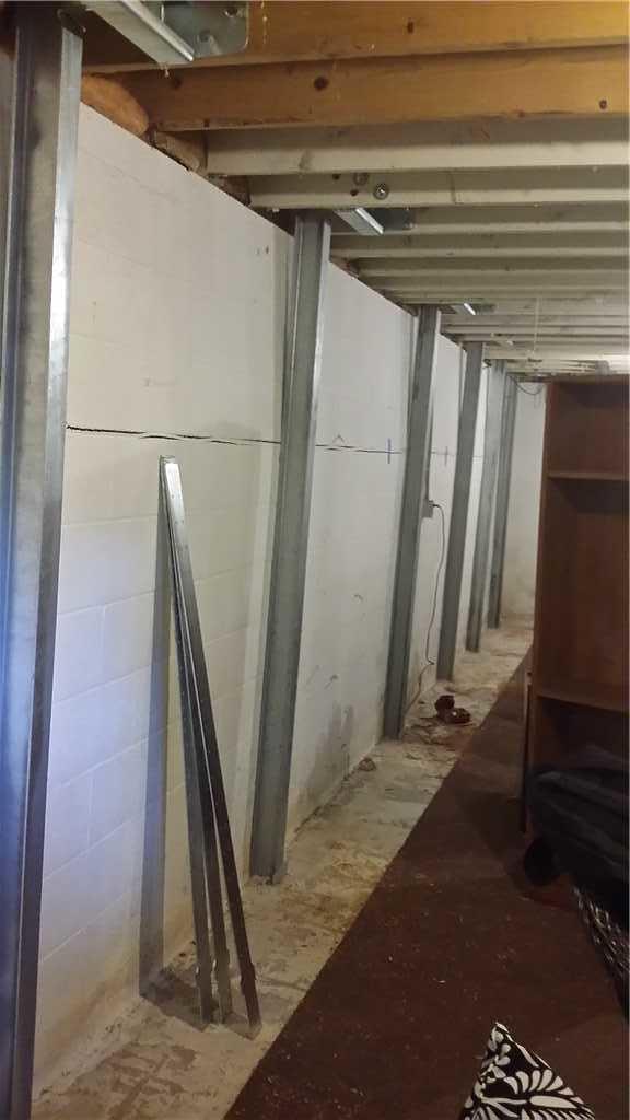 Ayers Basement Systems Before & After Photo Set Power Braces Straighten Walls in Antrim County, MI