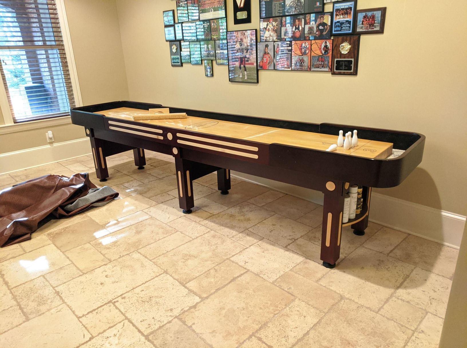 The Junkluggers of North Atlanta Before & After Photo Set Shuffleboard Table Removal in Milton, GA