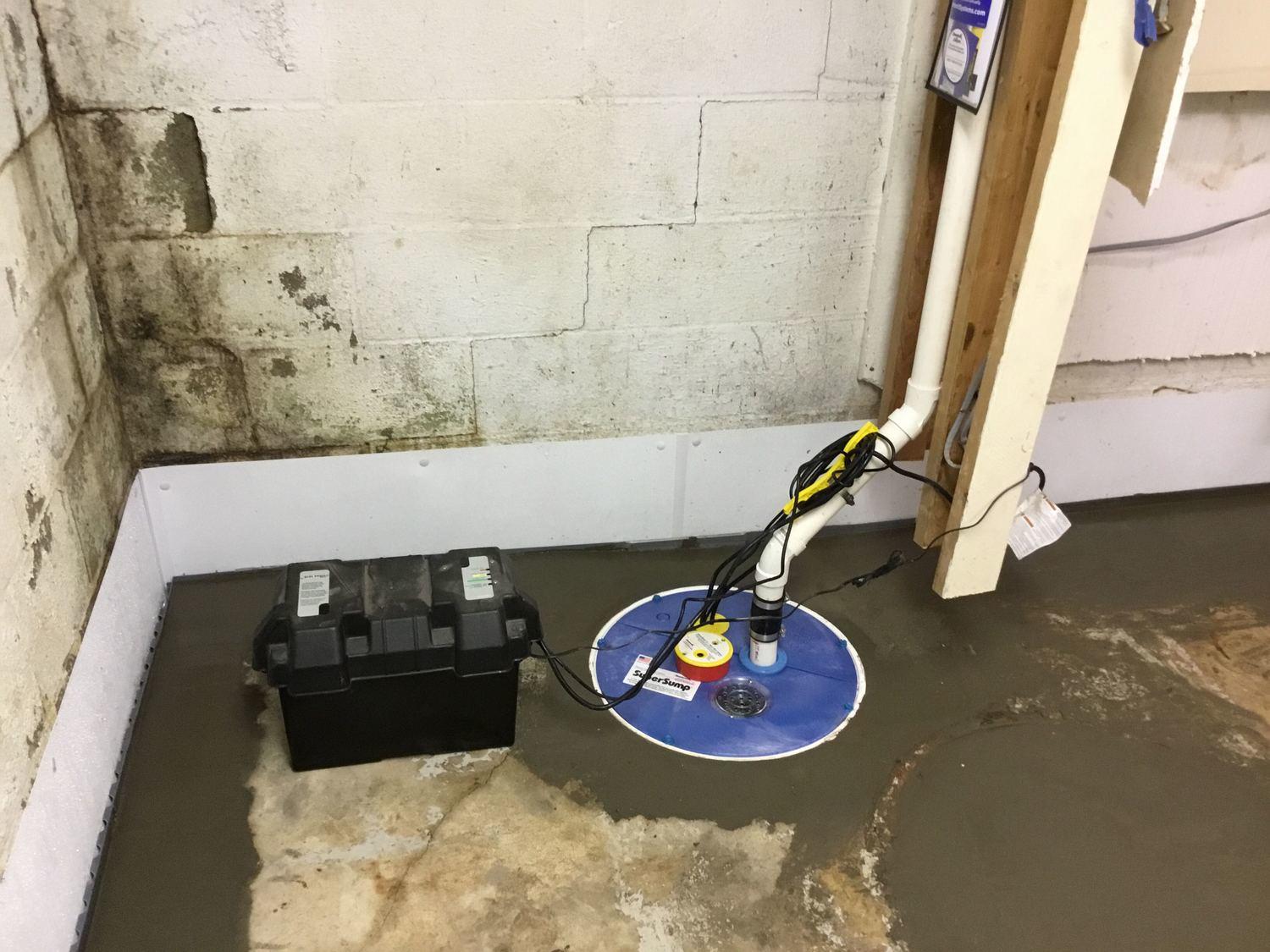 WaterGuard Basement Waterproofing System and a SuperSump Pump system used to resolve water