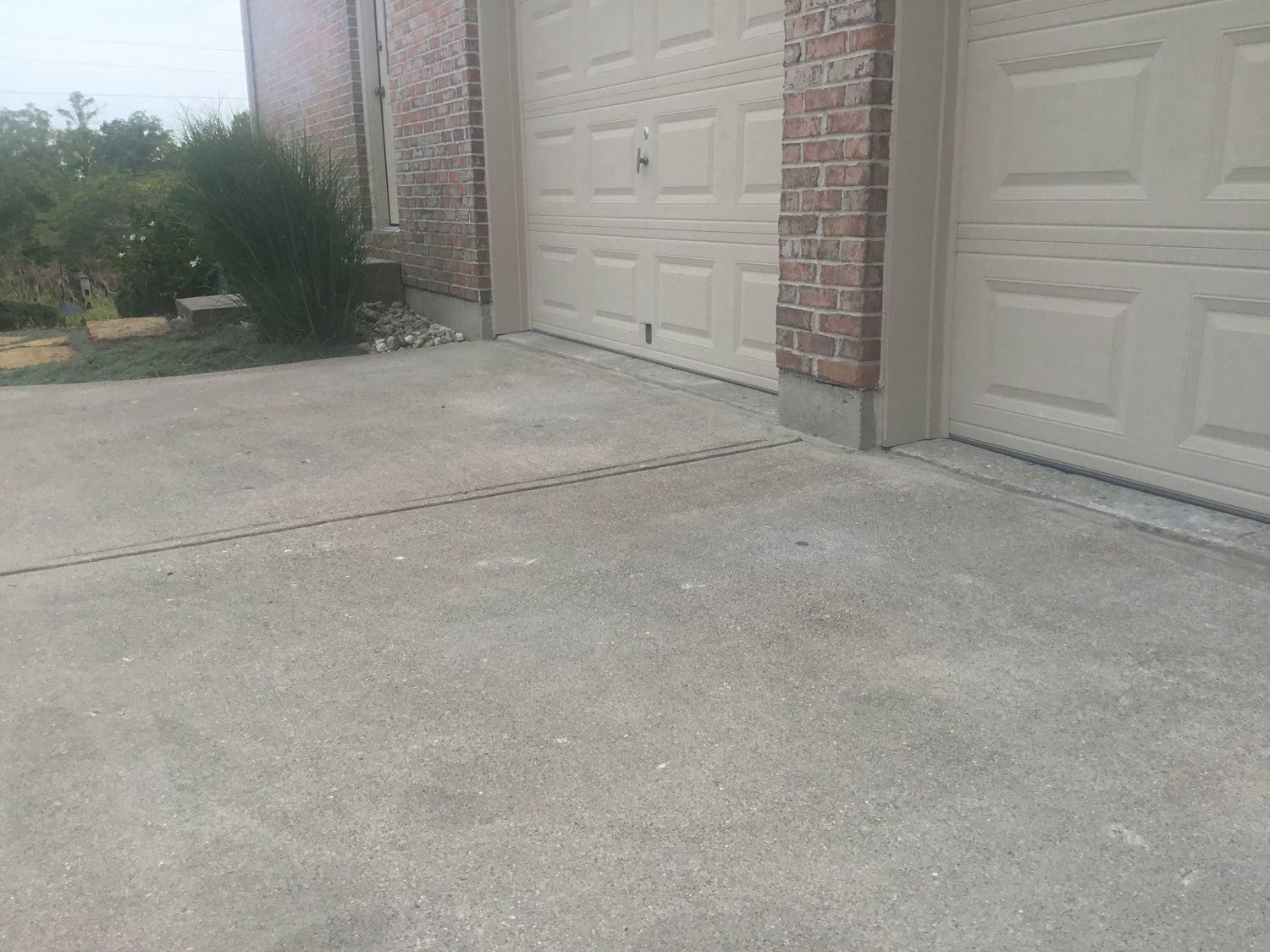 Concrete Lifting and Leveling Sunken driveway and sidewalk slabs are
