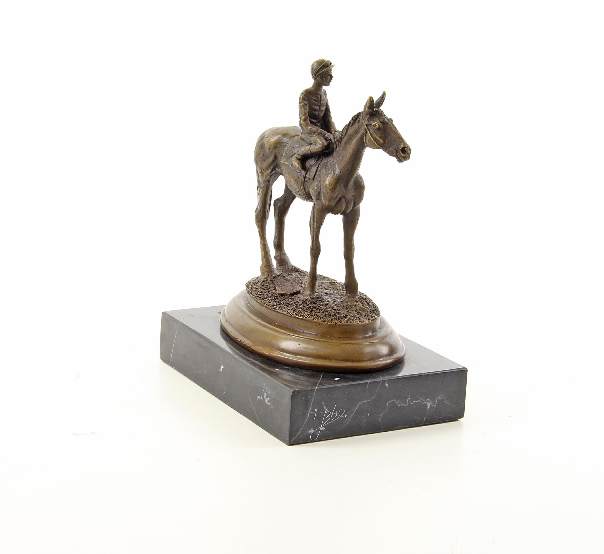 A bronze sculpture of a racehorse and jockey