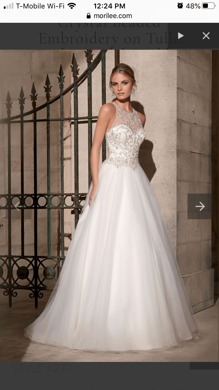 Selling never worn wedding dress