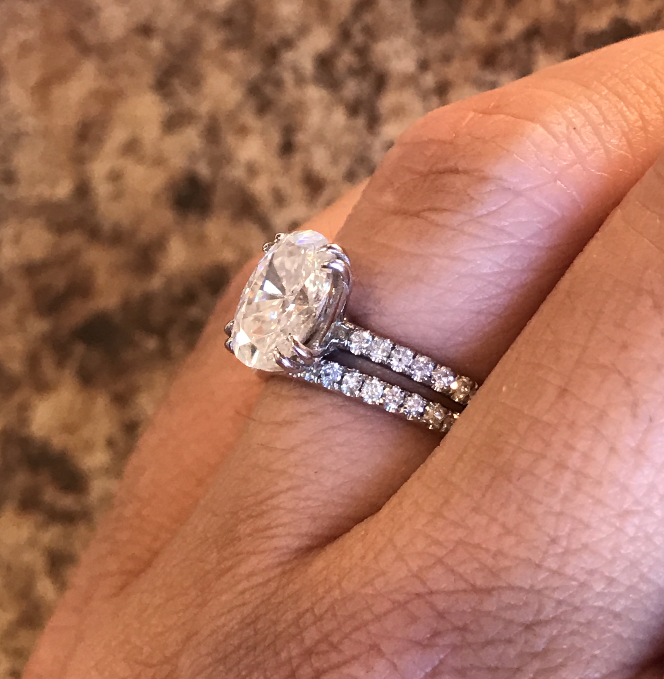 How tall is your ring? Or how much sits off your finger?