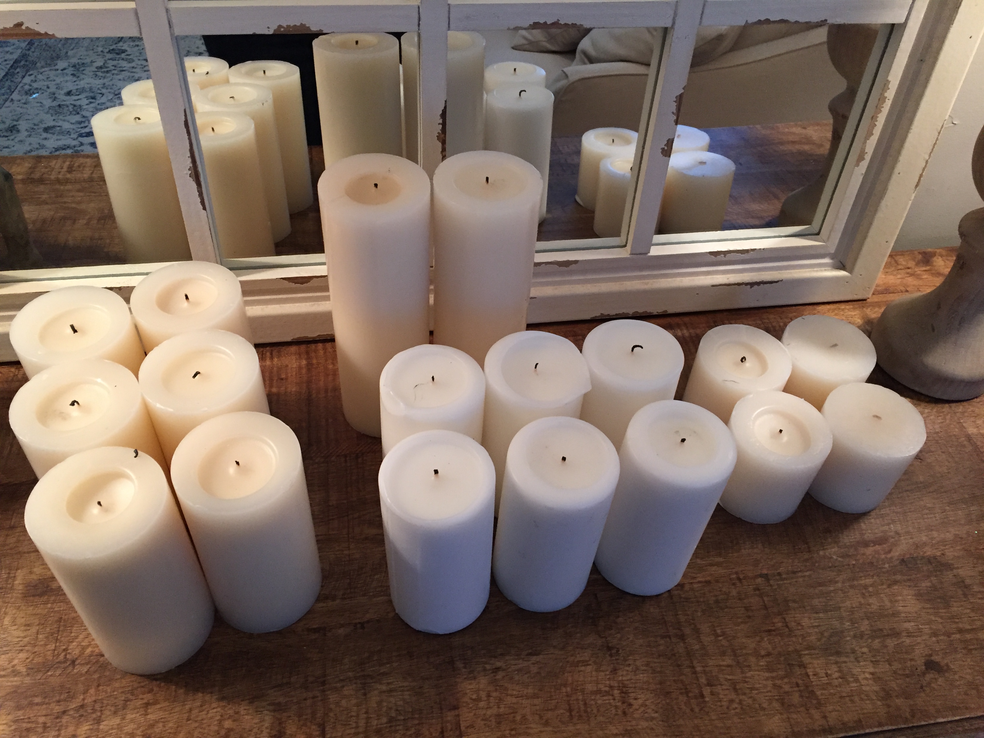 Assortment of white and ivory pillar candles (18 pieces)
