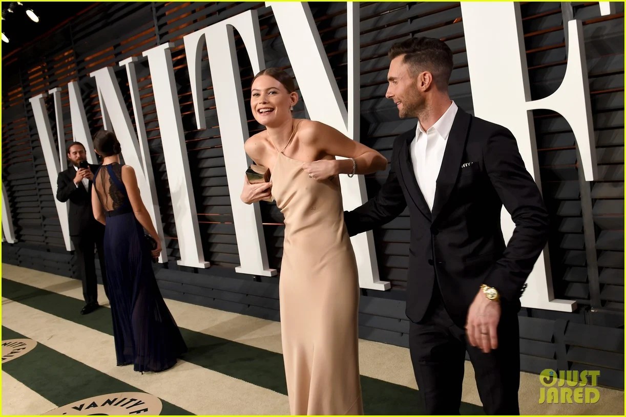 Adam Levine Hides Behati Prinsloo's Nip Slip at Oscars Party Photo