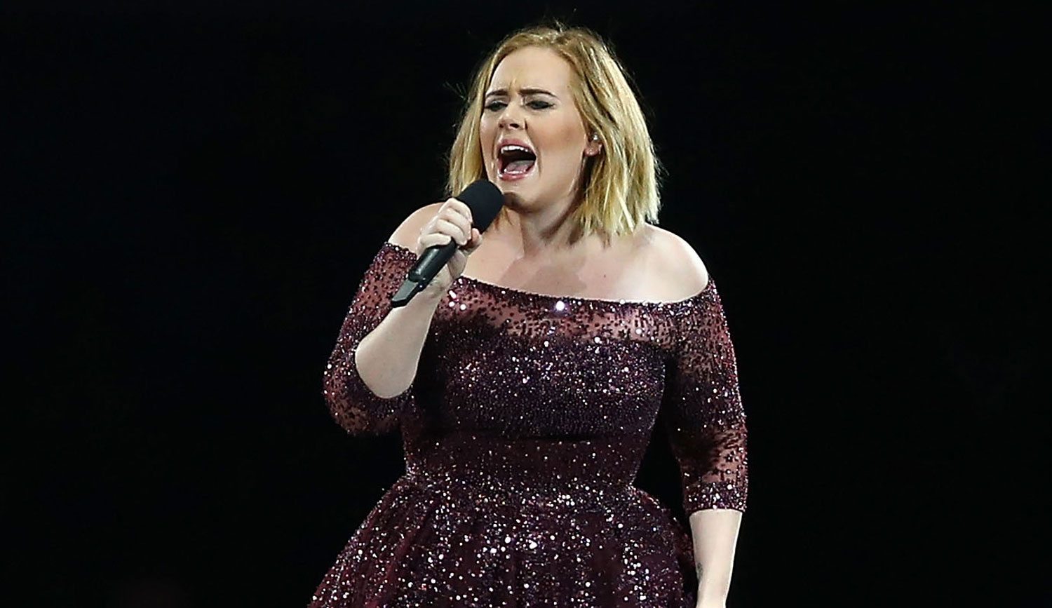 Adele Sings Along to ‘Lean on Me’ at Grenfell Tower Memorial Adele