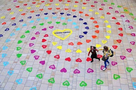 Solve A mother and daughter walk over a new public artwork in Bristol