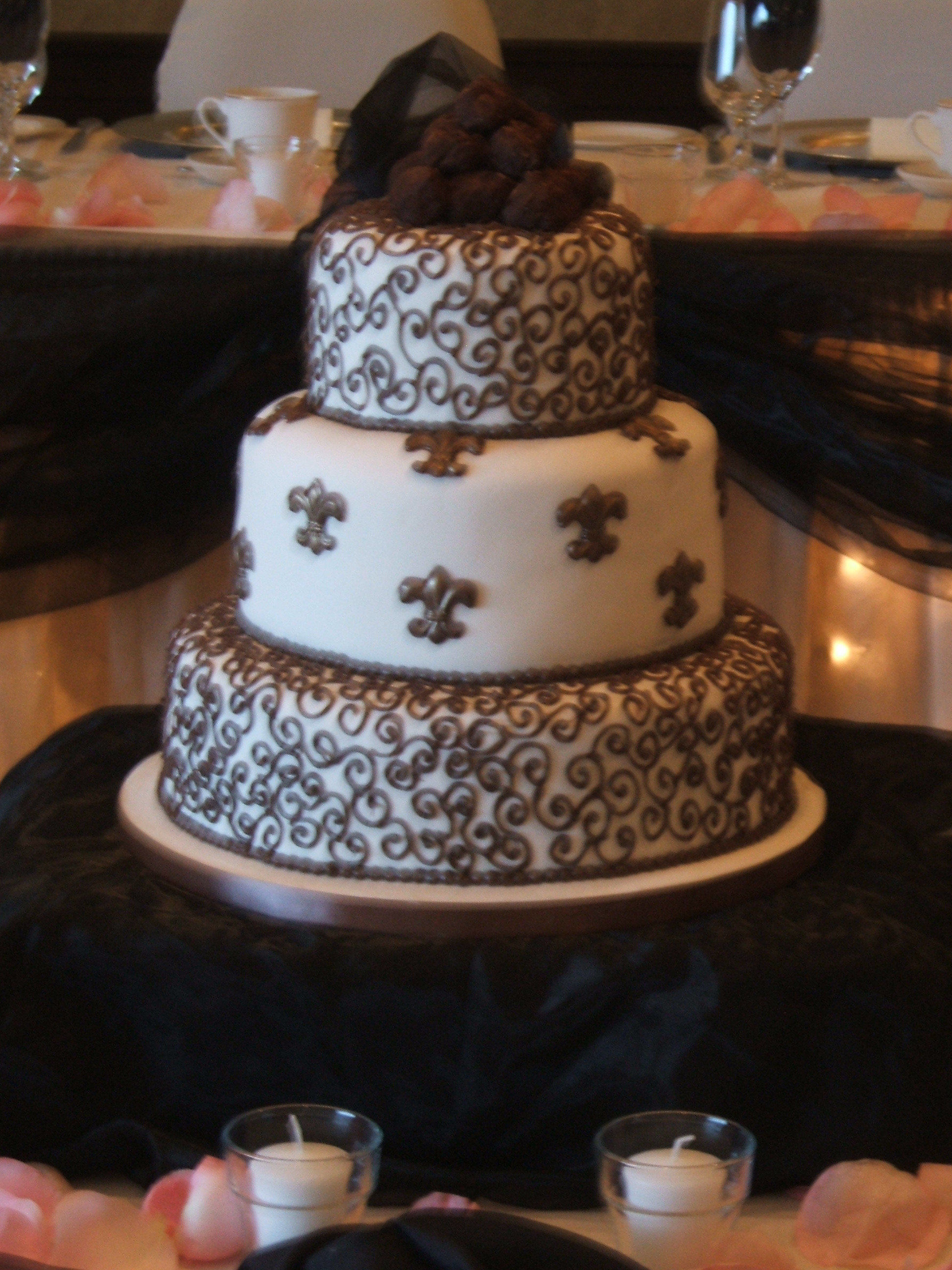 Rich chocolate truffle cake with chocolate fleur de lys and real French