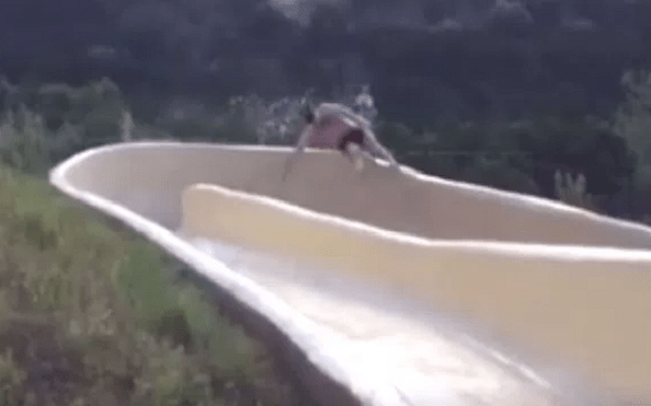 VIDEO Texas man goes flying off water slide and over a cliff