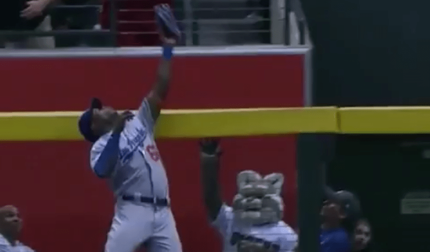 Yasiel Puig robs J.D. Martinez of a home run with a great leap at the wall